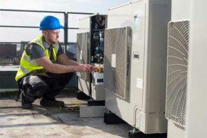 Image showing a team of technicians performing commercial HVAC repair services.